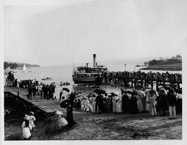 Crowd and ferry at the Lindisfarne Jetty